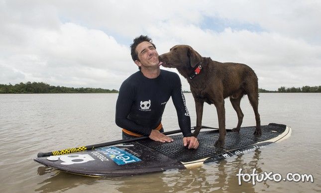 Homem e Cachorro quebram recorde no surf
